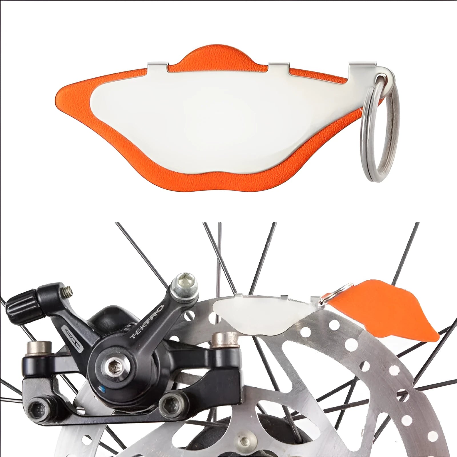 Mountain bike disc brake linings in black and orange colours with adjustment flap