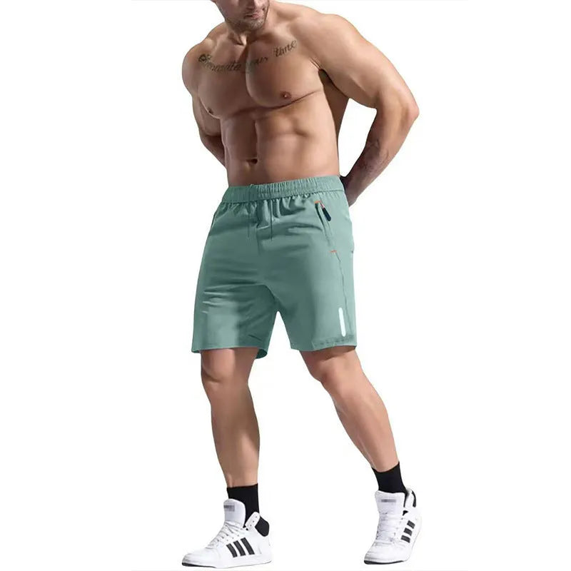 Men's grey elastic waist sports shorts made from bamboo fibre polyester fabric on a plain background.