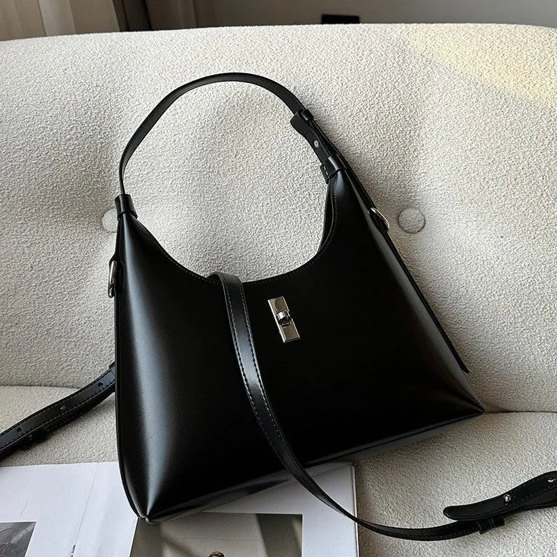Genuine leather crossbody shoulder bag in dumpling shape with sandwich pocket design