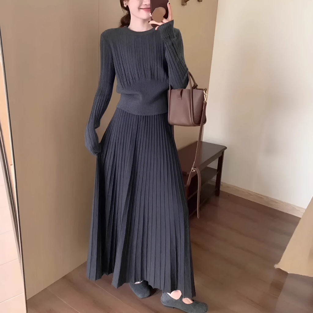 Dark grey knitted sweater and skirt suit set with artistic retro 3D pattern.
