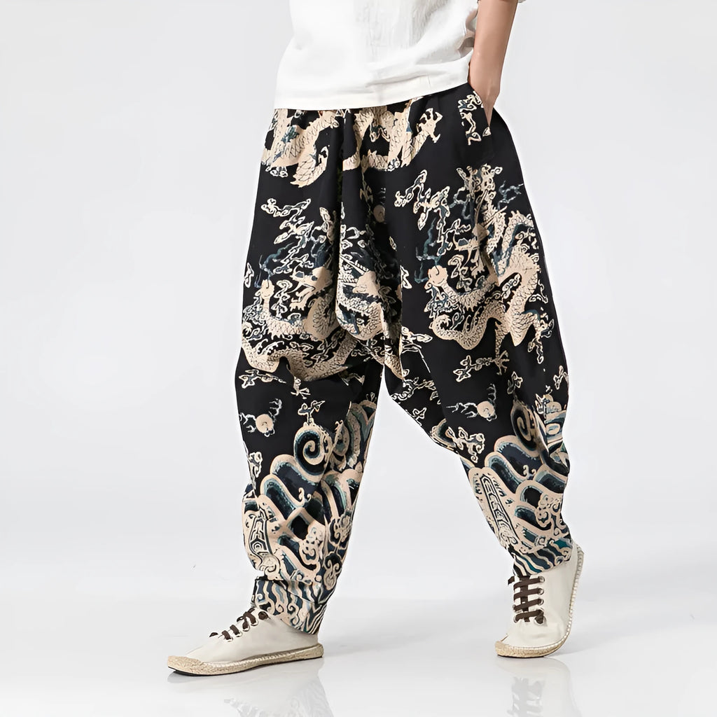 Men's dragon print cross harem trousers with elastic waist and loose leg