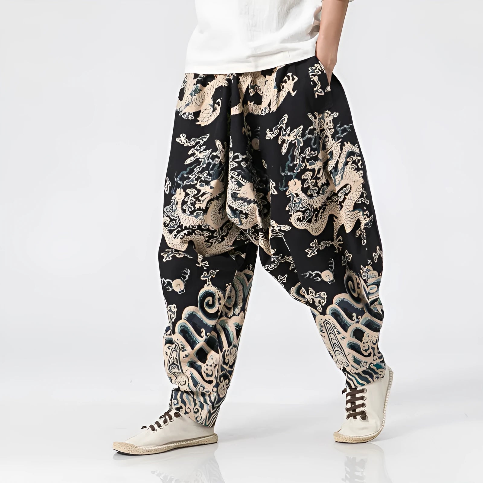 Men's dragon print cross harem trousers with elastic waist and loose leg