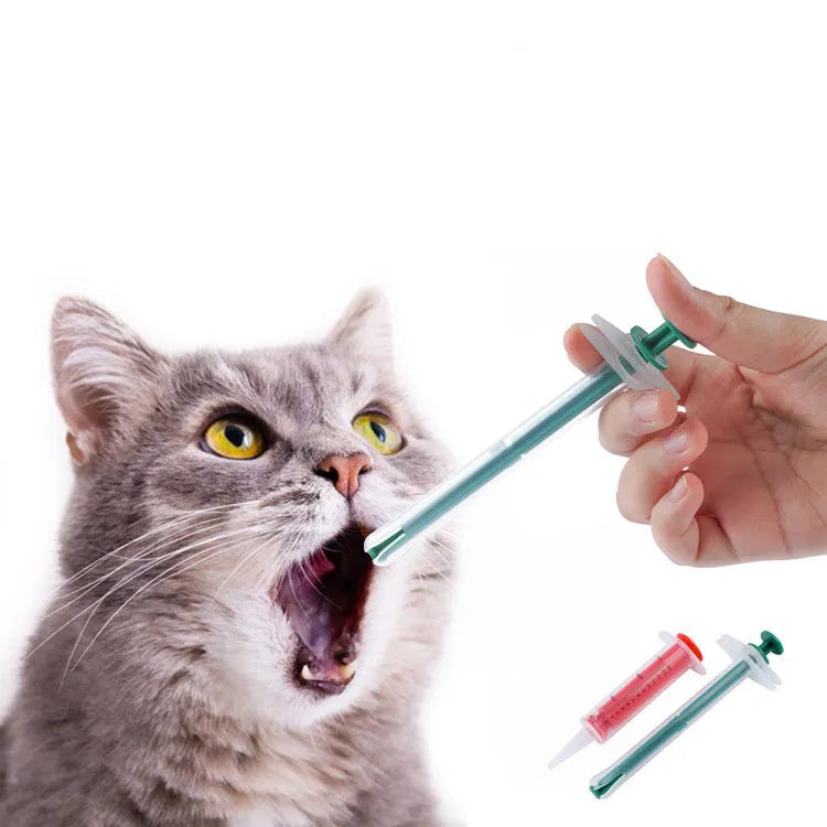 Two pet pill shooters with soft tip syringes for administering tablets to cats and dogs