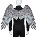 White 3D angel wings costume accessory made from non-woven fabric on child, 33cm by 68cm by 54cm