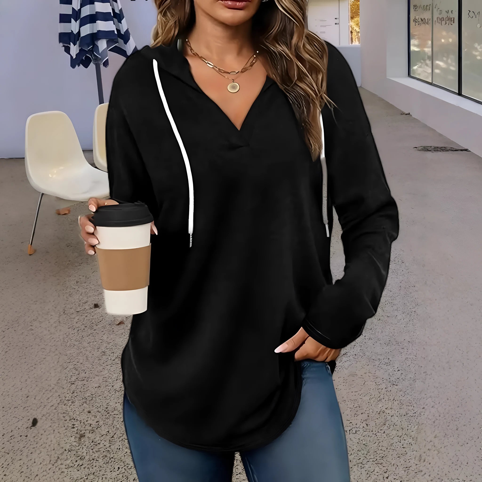 Women's red V-neck hooded sweatshirt with long sleeves in loose fit