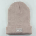 LED headlamp glowing knit warm hat in beige with built-in flashlight for camping