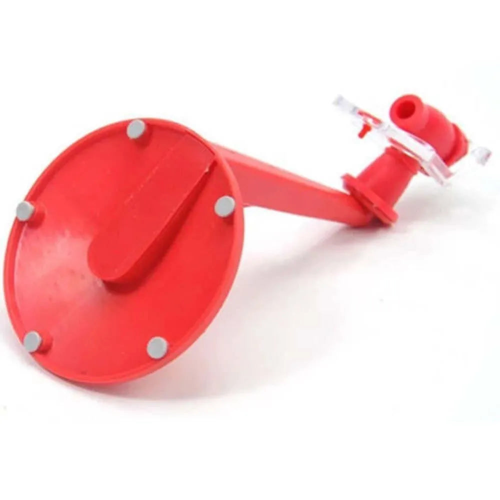 Red plastic Magic Tap soda dispenser attached to an inverted 2-litre bottle.