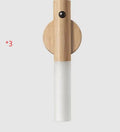Smart sensor LED desk lamp in wood and acrylic on a desk surface