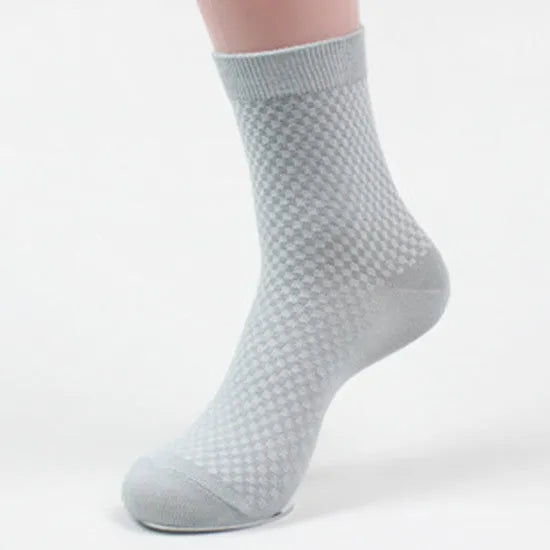 Men's bamboo fibre socks showing small square pattern in five colour options