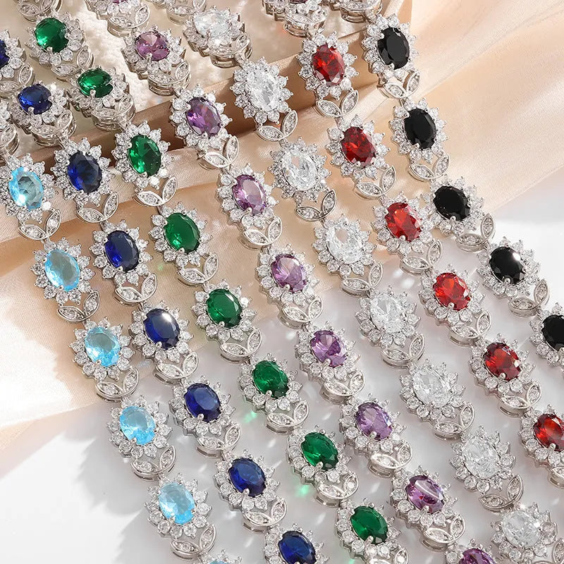 Women's bracelet with coloured zircon stone inlays in environmentally friendly alloy with electroplated finish