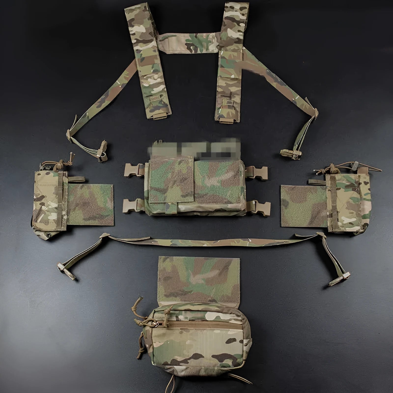 Multifunctional expandable breathable chest mount vest in Cordura fabric, unisex one size fits all, side view with gear pouches