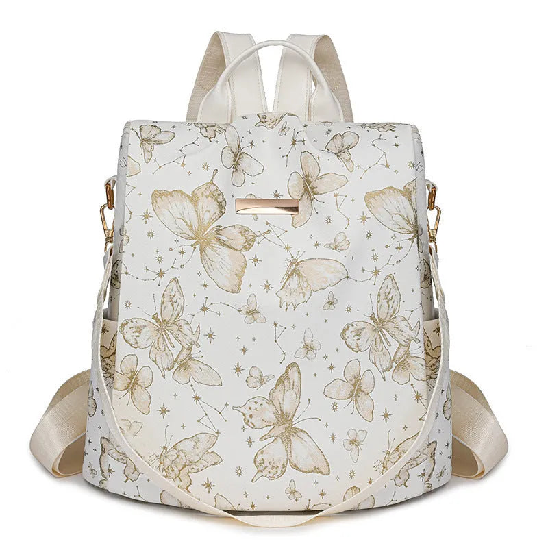 Butterfly print PU backpack on a physiological curve backplate, shown in khaki colour.