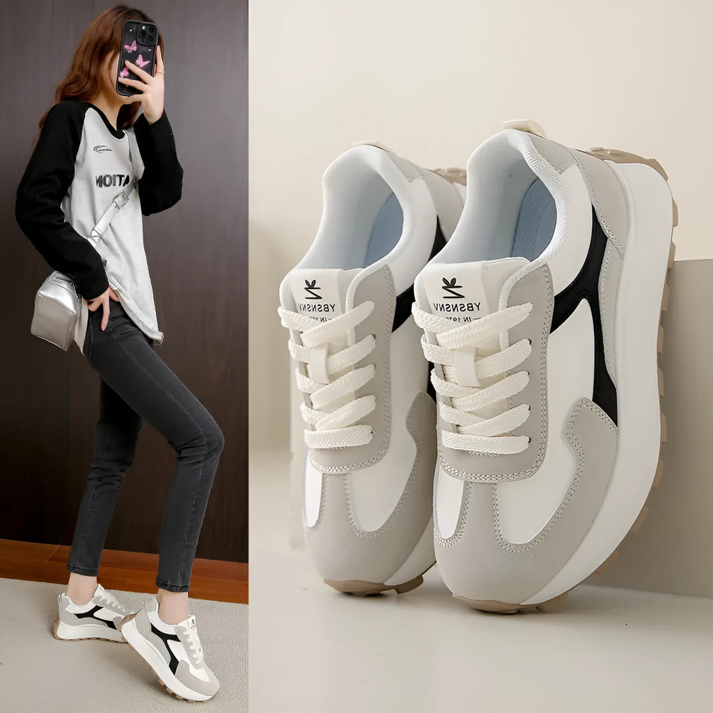Women's low-top platform sports shoes in card black colour with lace-up front and rubber sole