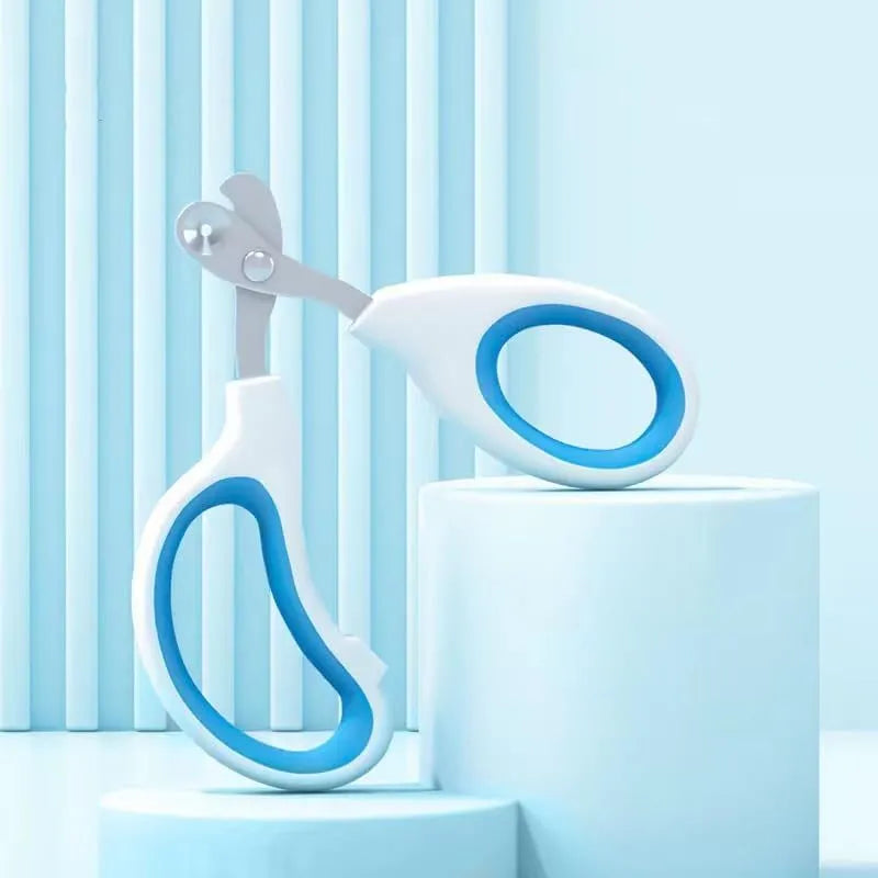 Blue pet nail clippers with a circular cutting hole and non-slip handle for trimming cat nails.