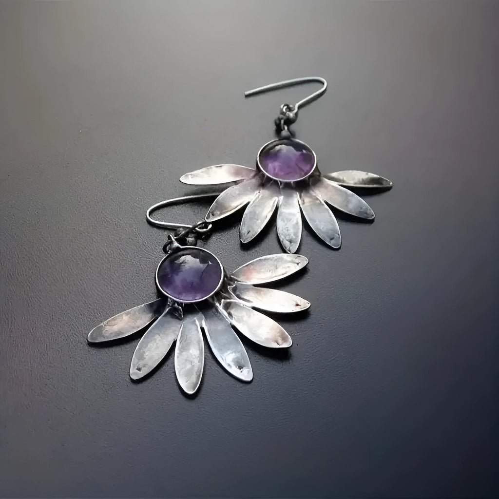 Purple Bohemian style drop earrings with resin gemstone accents and animal zodiac design on alloy framework