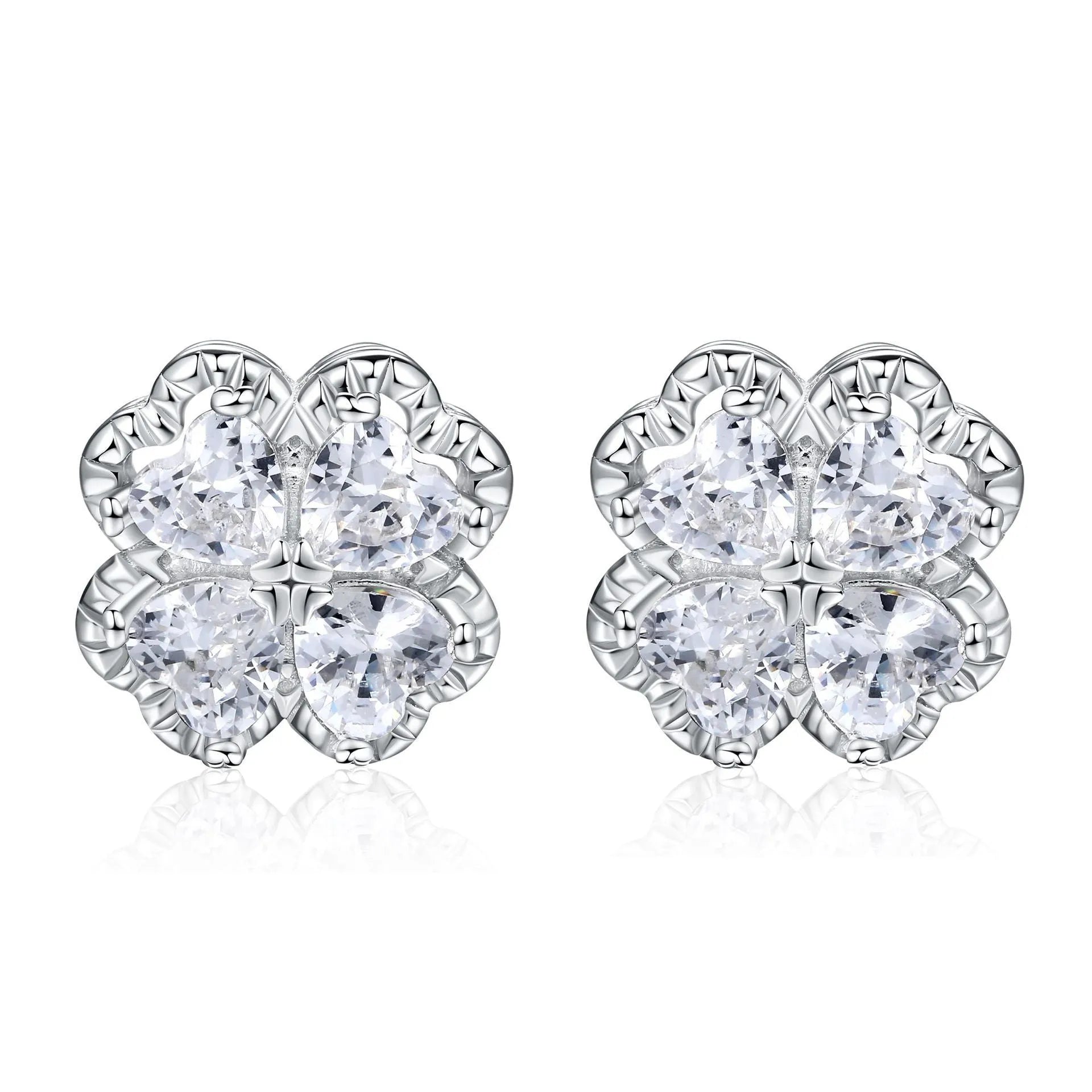 Pair of heart-shaped sterling silver earrings with four-leaf clover design and white gold colour finish.