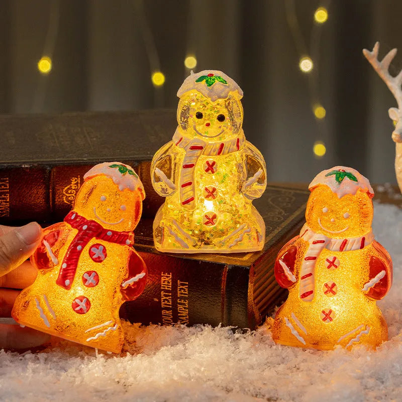 Glowing gingerbread man Christmas ornament with snowman design and LED lights