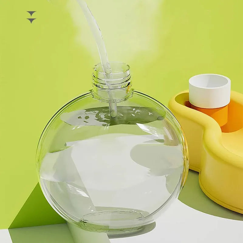 Green pet travel cup with pull-out drinking bowl for dogs showing leak-proof design