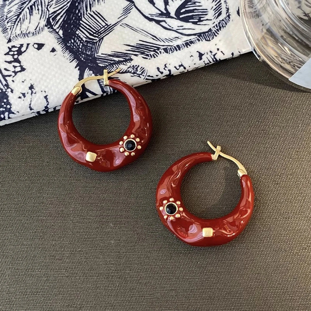 Hong Kong style retro ear studs with alloy construction and black rhinestone detailing