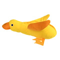 Yellow plush duck dog toy with squeaker and treat-dispensing feature for training and play.