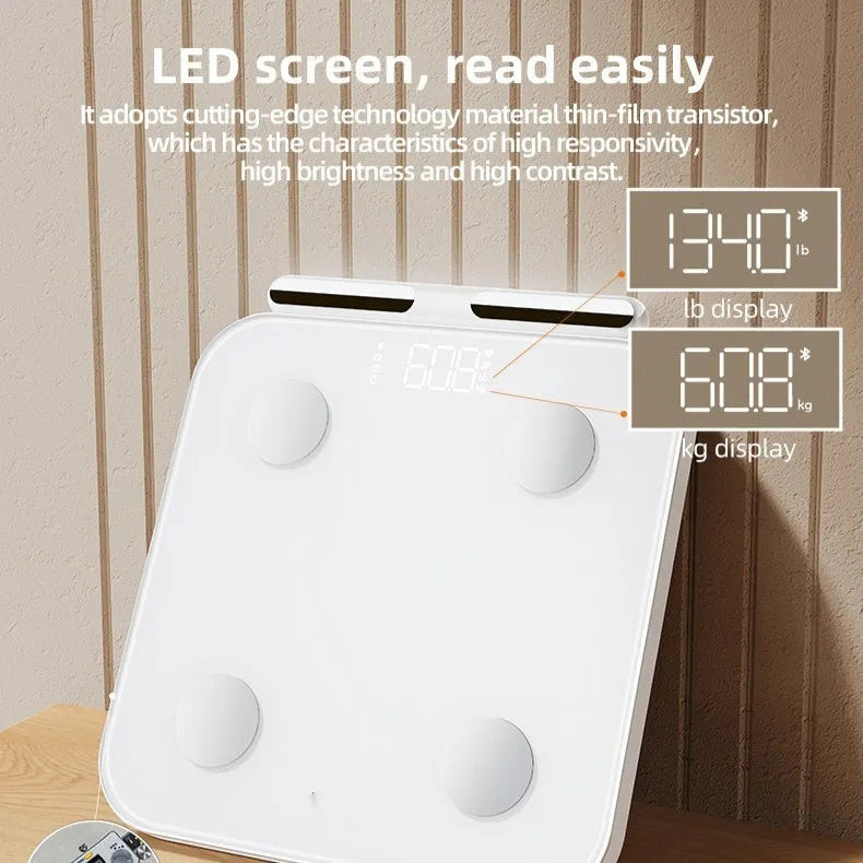 White professional body fat scale with 8 electrodes on tempered glass platform