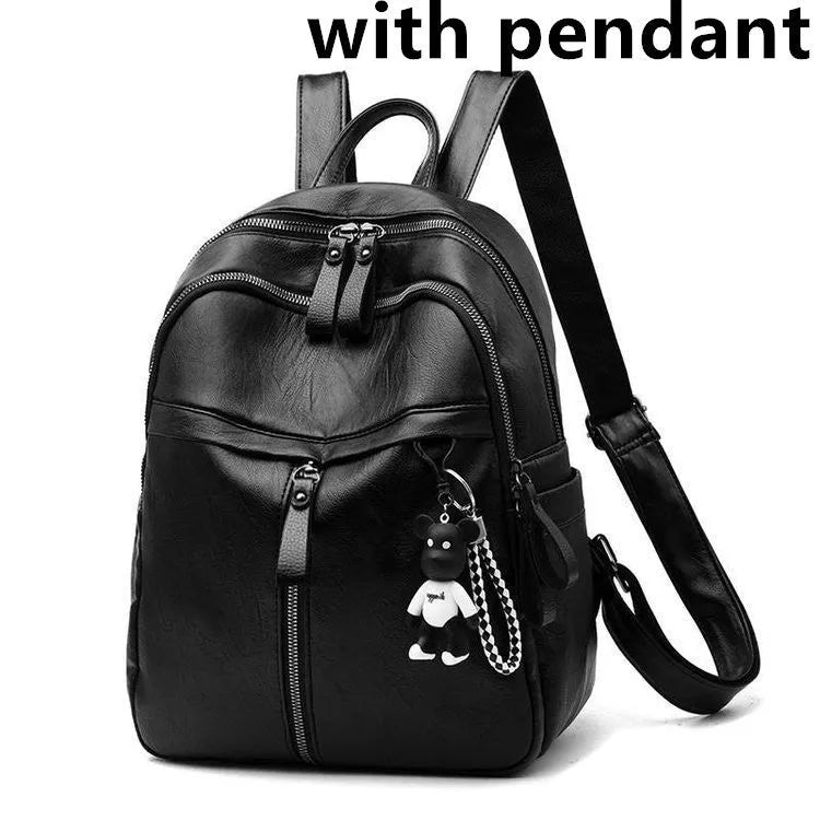Black PU leather backpack with double straps showing internal ID bag compartment and zipper closure