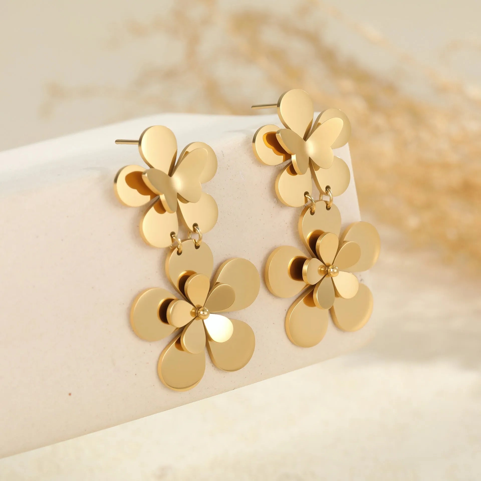Gold flower butterfly stainless steel earrings with 18K electroplated finish for women