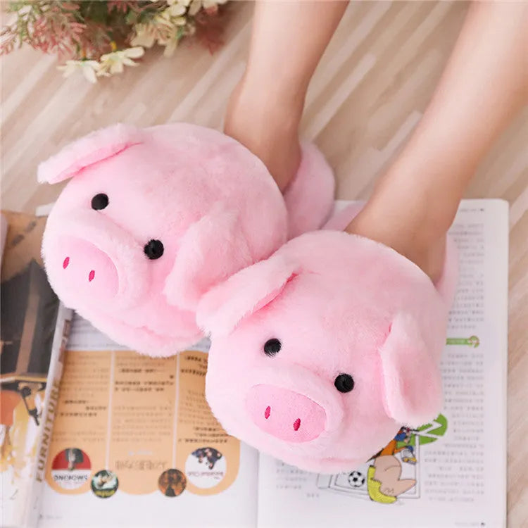 Pink pig floor slippers with short plush fabric and PP cotton filling.