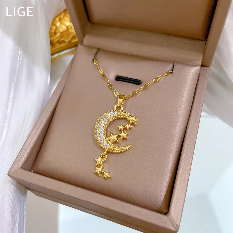 Moon pendant necklace with tassel details on stainless steel chain