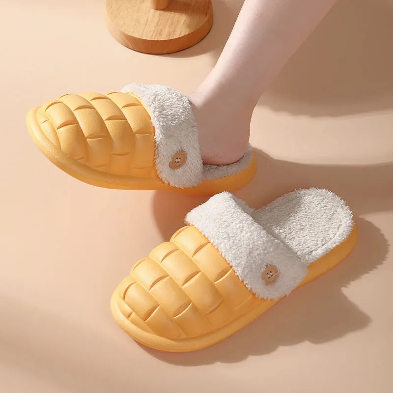 Plaid patterned EVA detachable slippers with plush lining, shown in pink, on a plain background.