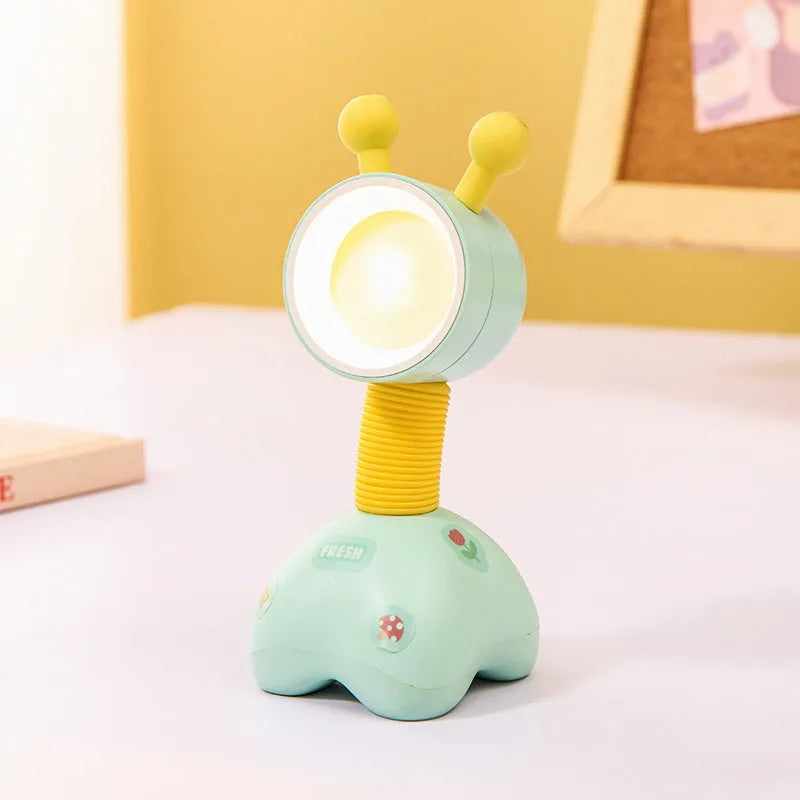 DIY cartoon magnetic small night lamp in assorted animal styles and colours on a desktop.
