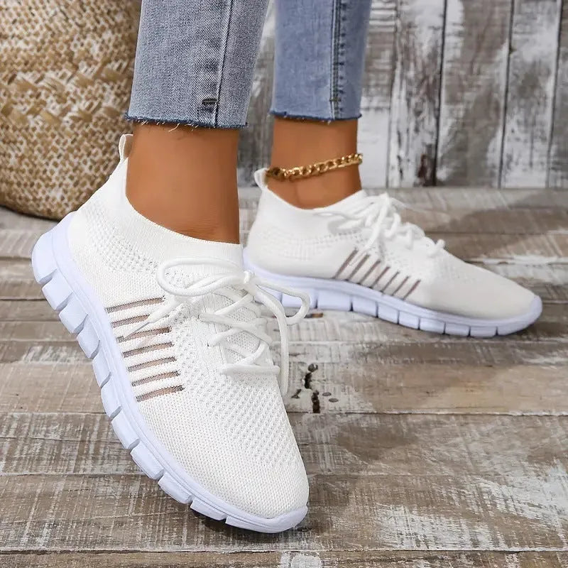 Women's breathable mesh flying knit flat shoes with front tie and low heel in multiple colour options