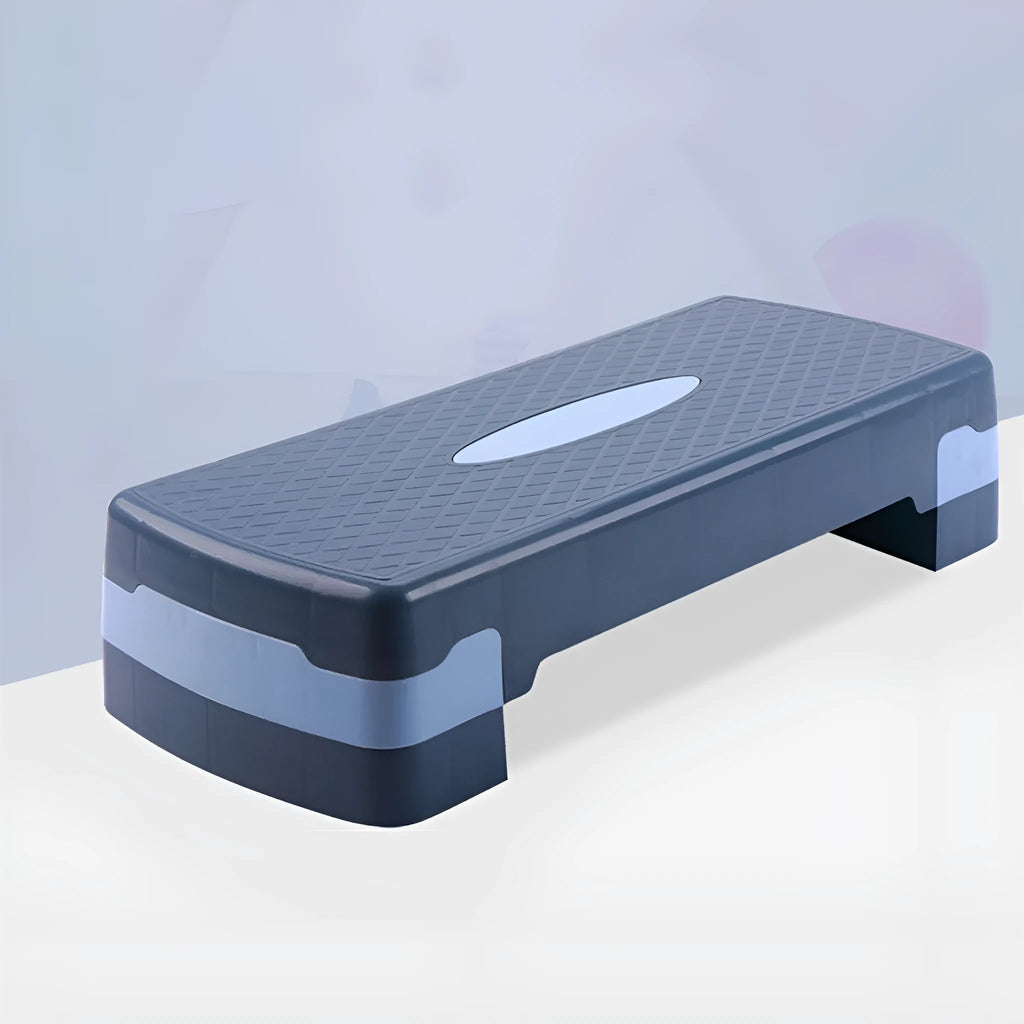 Fit Step aerobics platform in grey on a home floor, showing its 68cm length and 15cm height.