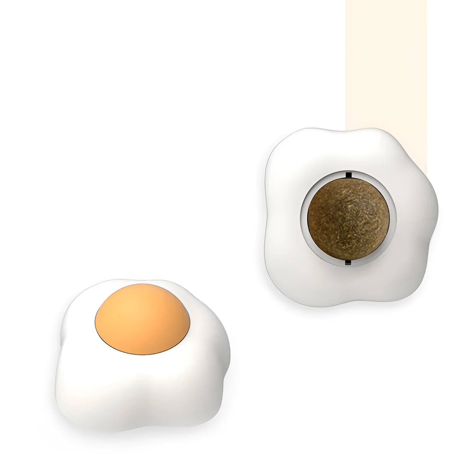 Interactive catnip ball toy stuck to wall with cat playing, showing fried egg and poached egg shape options