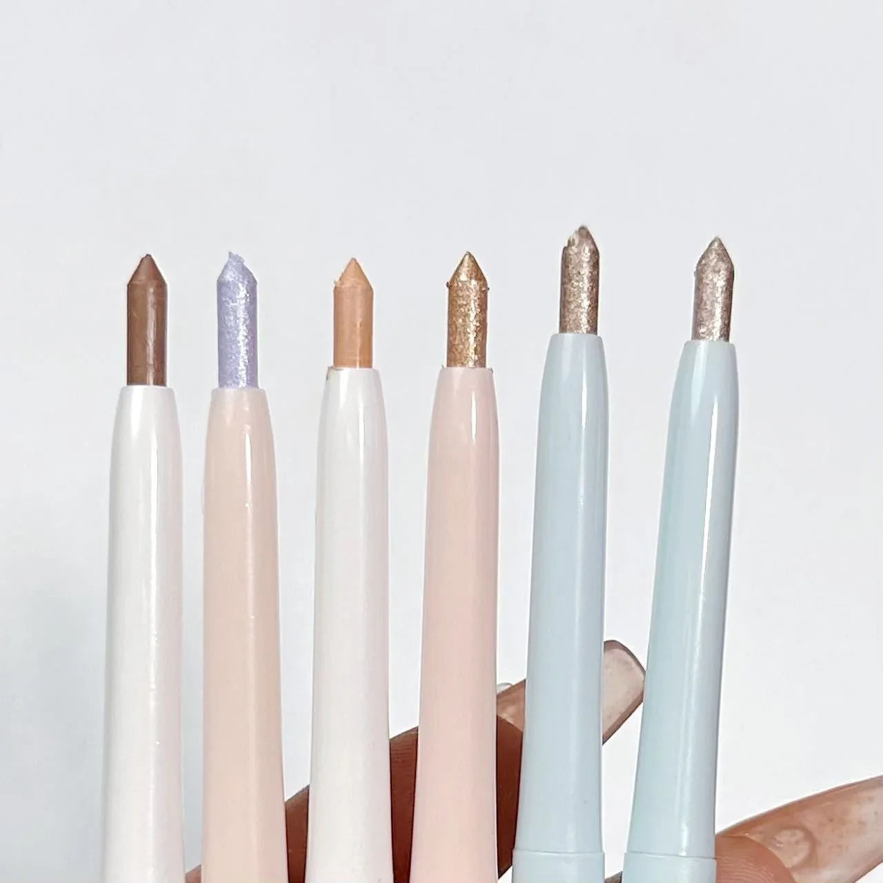 INS style eye shadow pen in a choice of six colours including camellia milk apricot and fragrant cocoa.