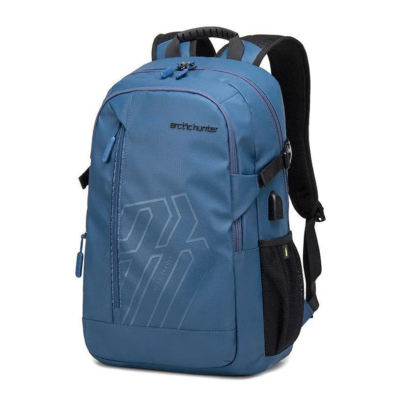 Casual blue plaid polyester 18-inch computer backpack with curved shoulder straps laid flat.