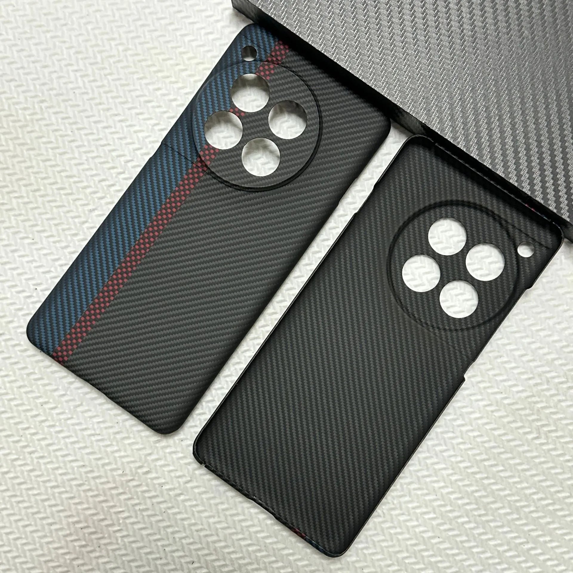 Black hand-woven Kevlar anti-wear phone case for OnePlus 12 with crater texture