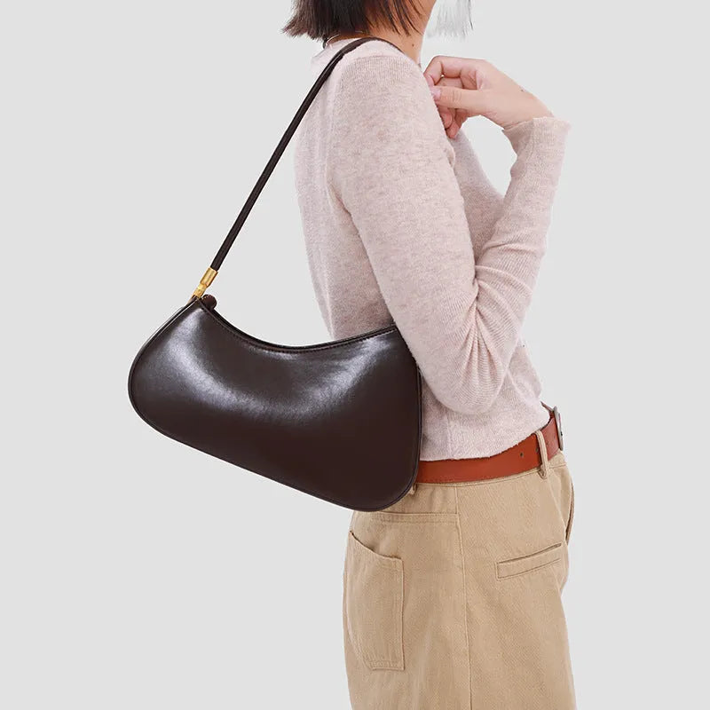Women's oval-shaped PU leather underarm handbag in multiple colours with sandwich pocket design