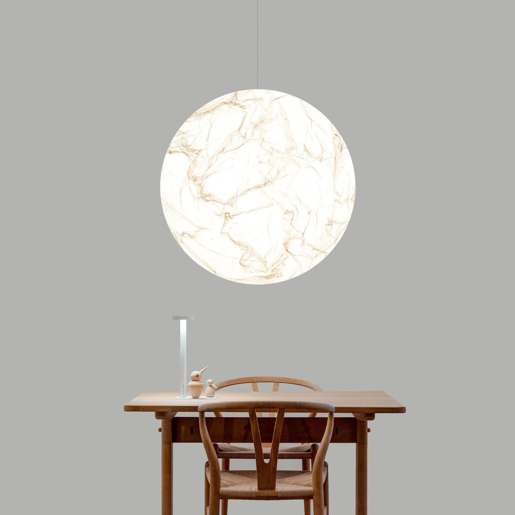 Moon pendant light in a double-height restaurant or living room – D40 or D50 size – low-voltage 36V – light luxury style