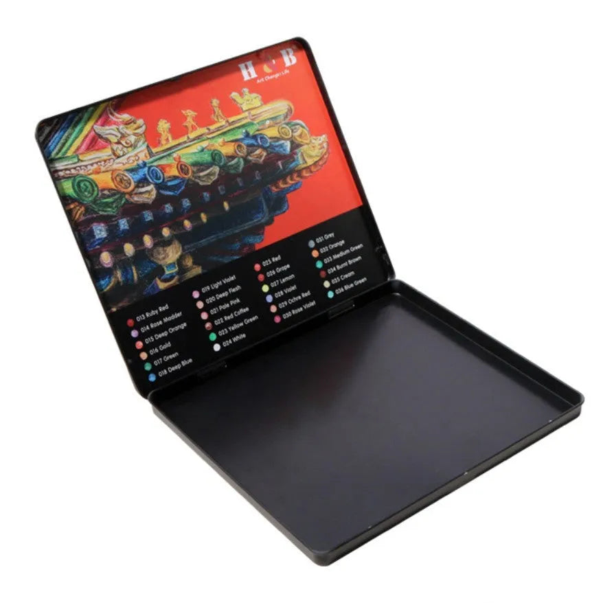 Water-soluble coloured pencil set with 24 colours and a brush in a black iron box.