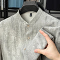 Men's solid colour linen shirt with stand collar in loose cardigan style