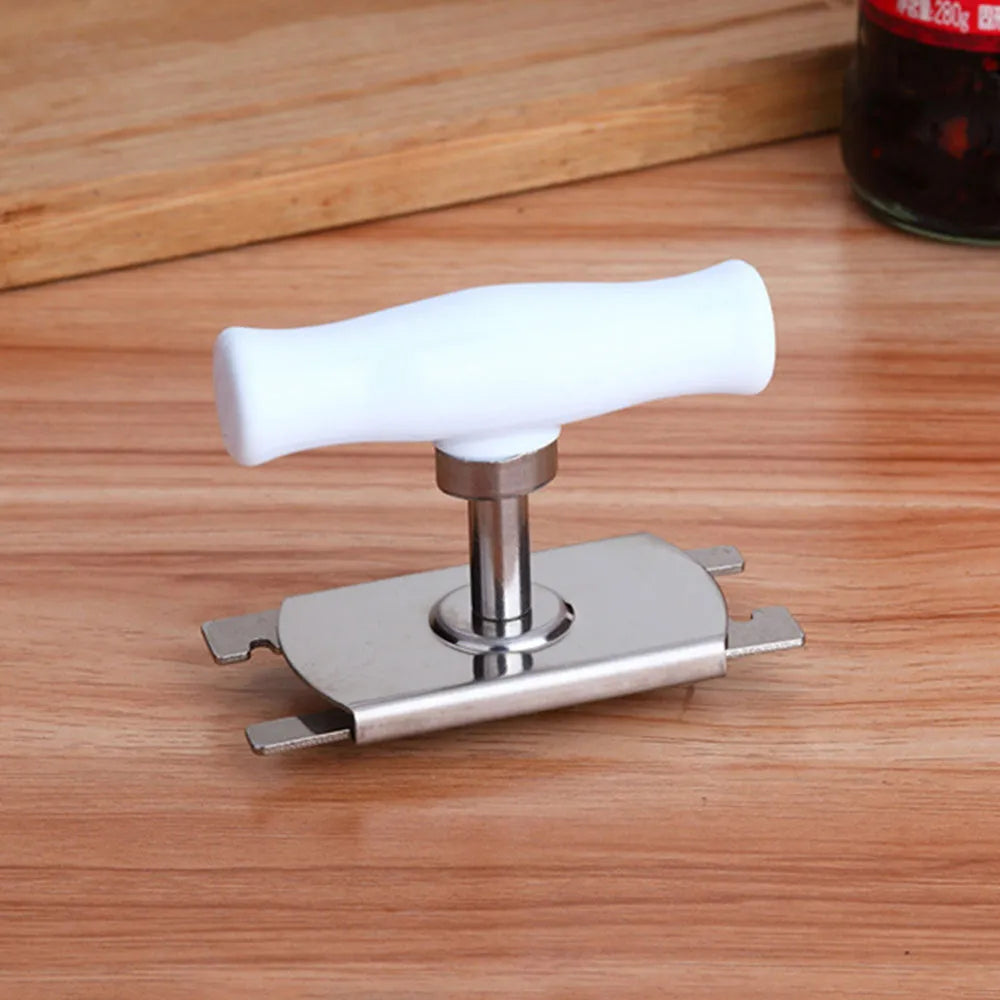 White stainless steel manual adjustable bottle opener with gear design on a table