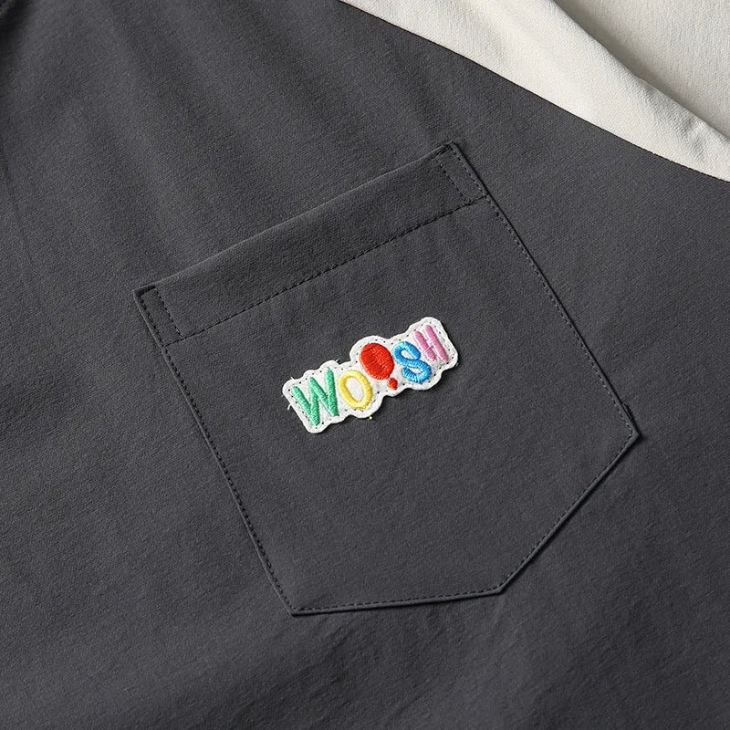 Dark grey men's t-shirt with contrasting raglan sleeves in loose fit casual style