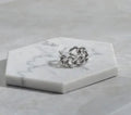 Golden aluminium alloy adjustable geometric ring chain on white background