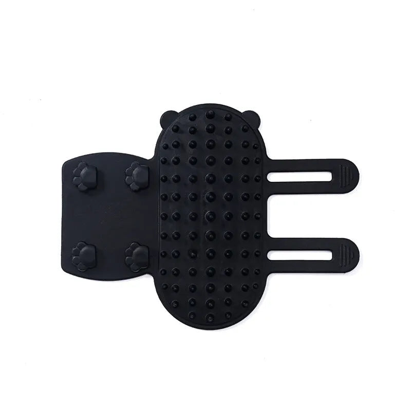 Adjustable silicone cat scratching brush mounted on table leg with rounded comb teeth for grooming
