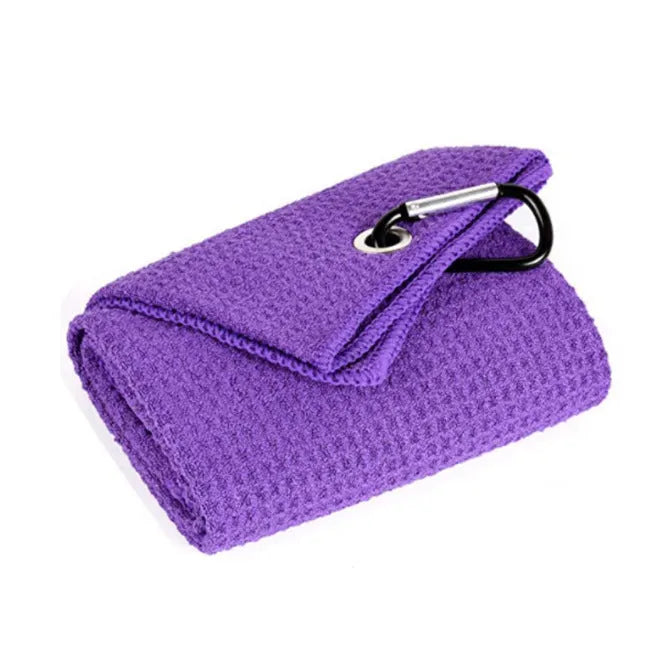 Waffle-textured golf ball cleaning cloth showing weave pattern in blue colour