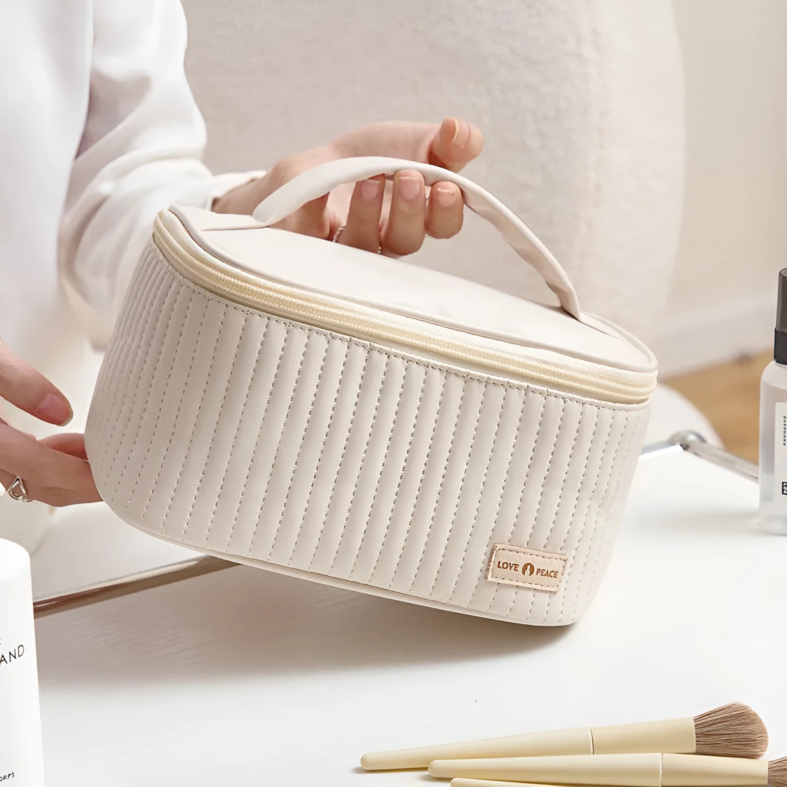 Open-top PU leather makeup bag in a solid colour from a choice of six options.