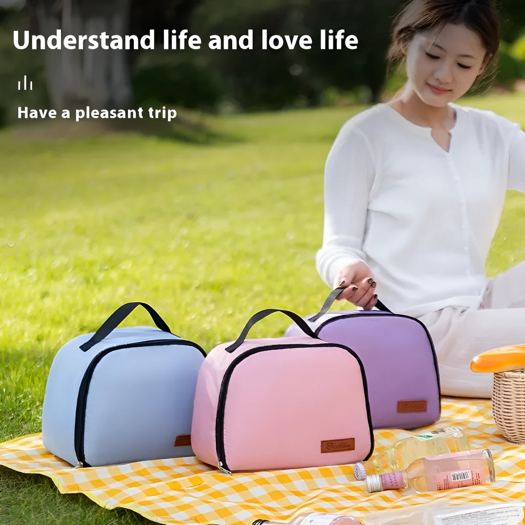 Insulated textured cloth lunch box bag in sapphire blue colour, shown with a lunch box inside.