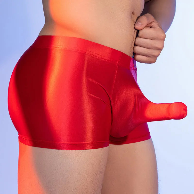 Men's red boxer shorts with an elephant nose design, made from breathable nylon fabric.