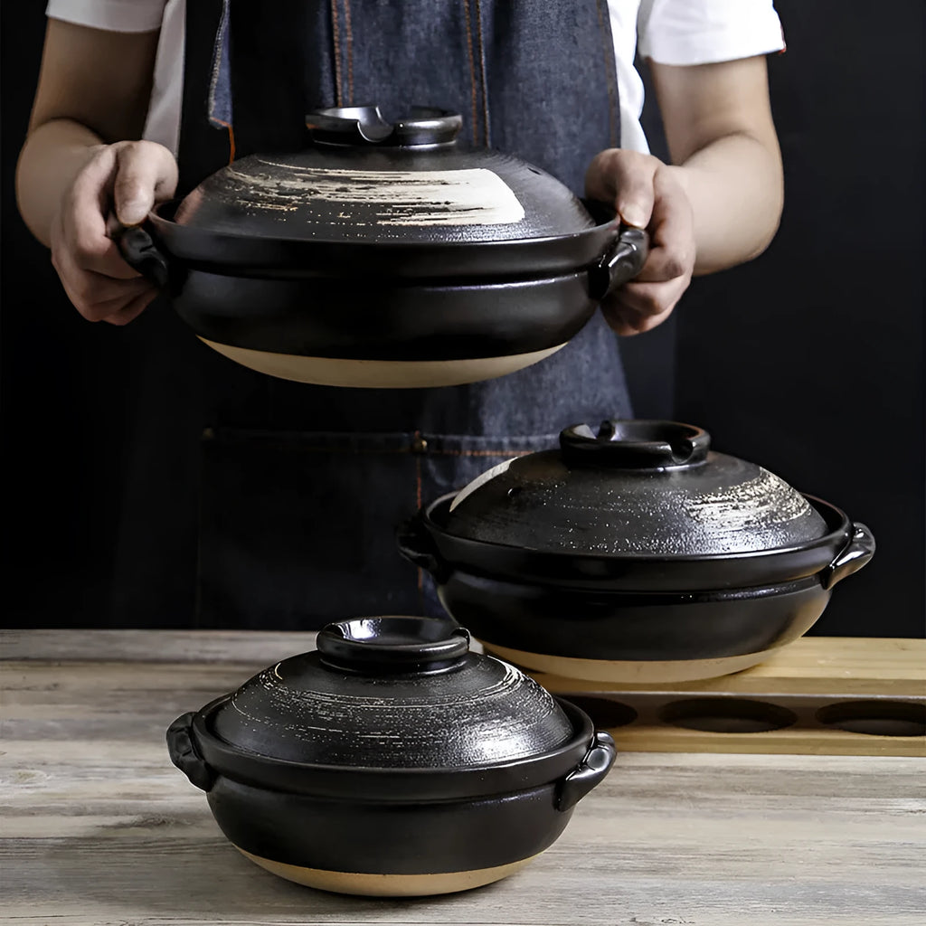 Ceramic casserole pot with lid, 2800ml size, on gas stove, uncoated clay finish
